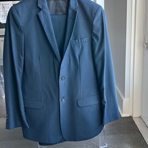 Boys size 20 (jacket) and size 18 (pants) calvin klein dark navy suit.